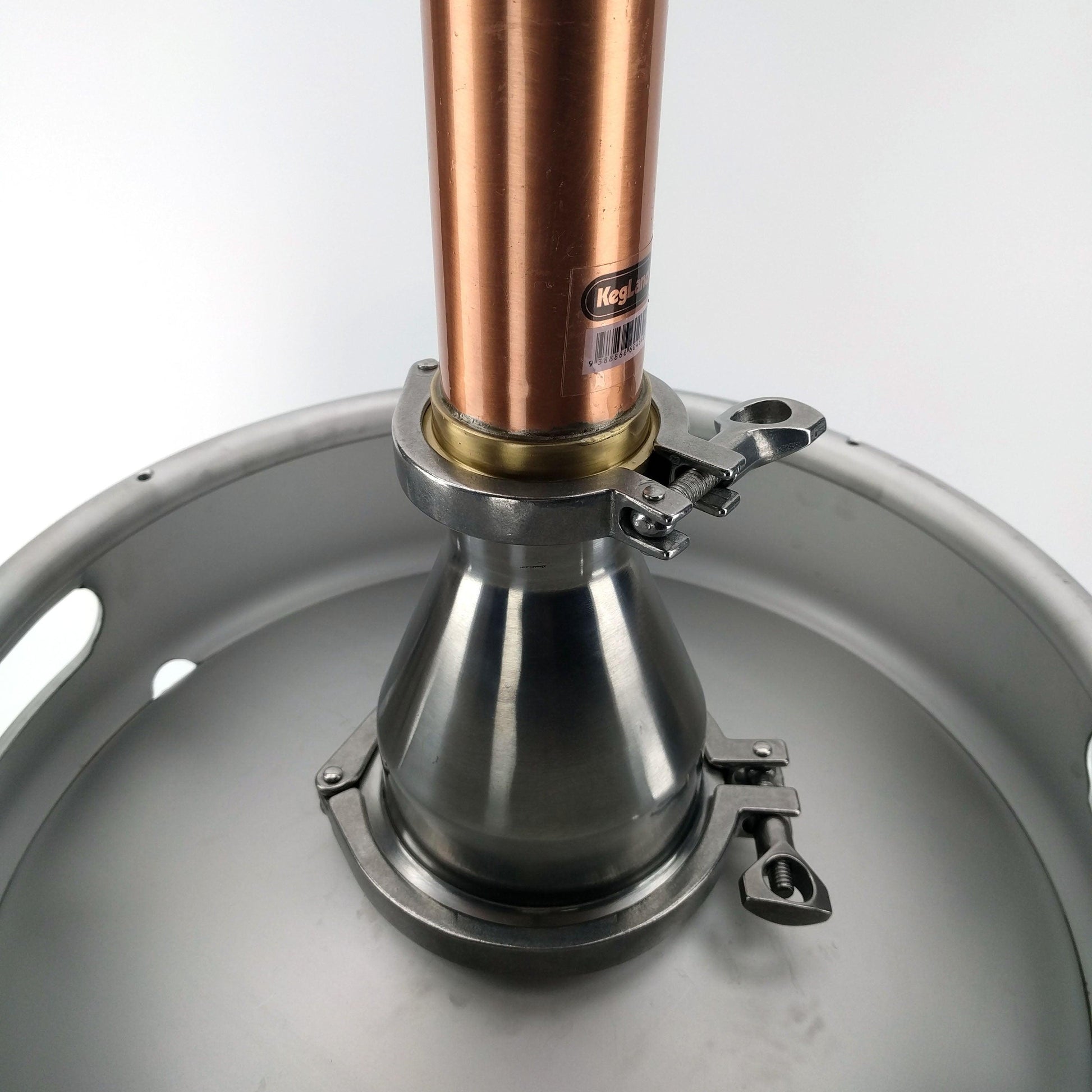 4 to 2 inch Tri-Clamp reducer with still column attached