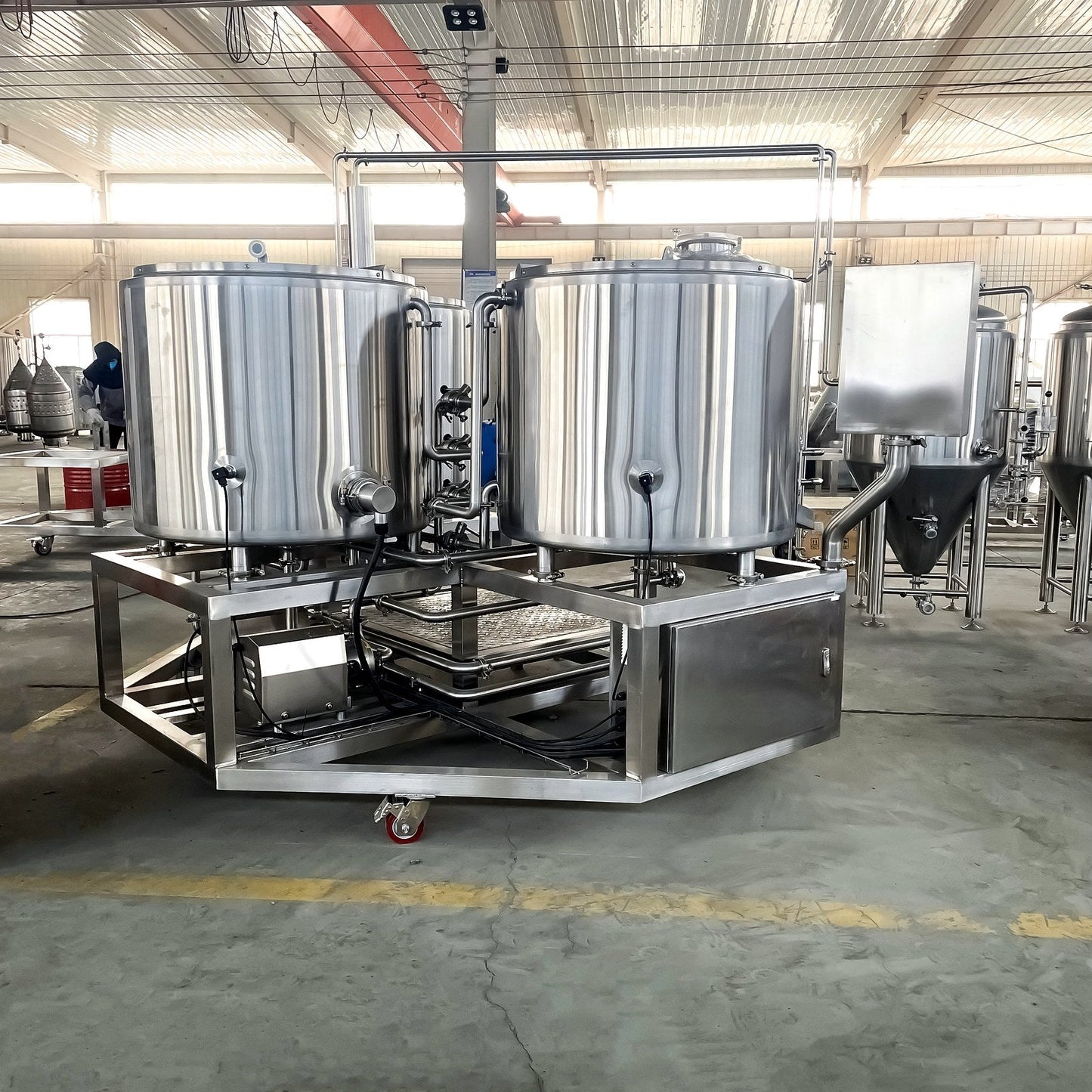 BrewTaurus PRO 250L brewhouse skid with integrated pump and piping
