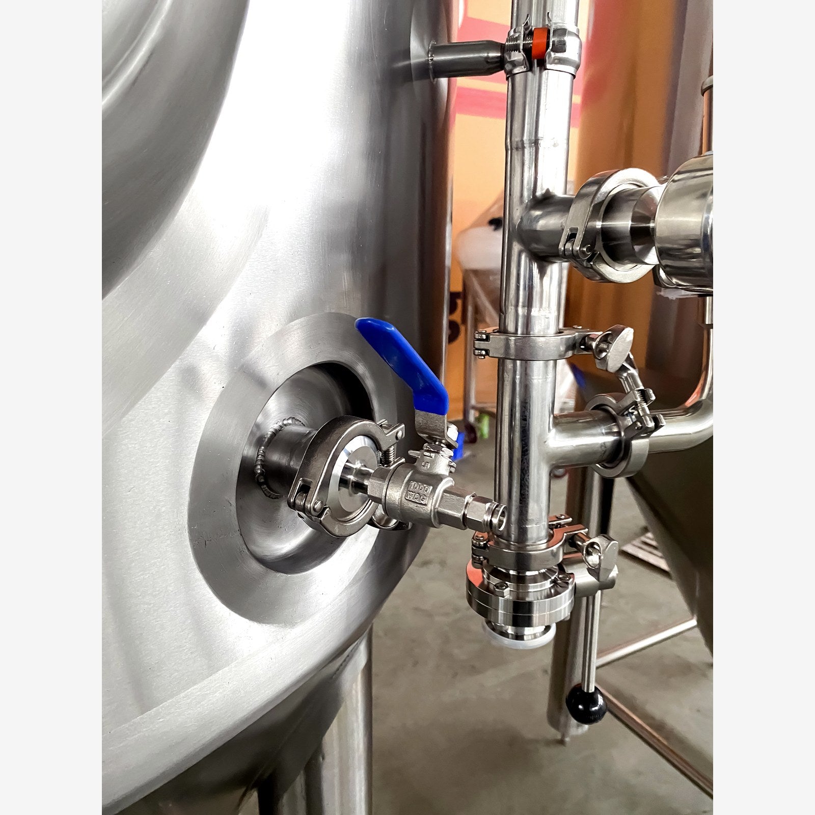 Racking arm and butterfly valve assembly on the BrewTaurus PRO 500L conical fermenter